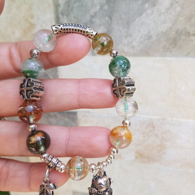 Vòng tay phong thủy may mắn đá thạch anh Ưu linh tự nhiên  Charm bạc kiểu hình chiếc lá mèo may mắn hoa đẹp lắm ạ  Nữ đeo lên tay vừa đẹp vừa sang tốt cho sưc khỏe, may mắn và phong cách trẻ trung sang trọng ạ
