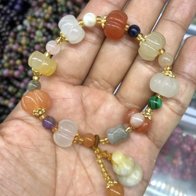 Vòng đeo tay, lắc tay phong thủy kiểu quả bí đá ngọc hoàng long