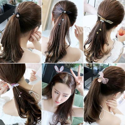 Sét 9 dây buộc tóc và kẹp xinh xắn, có kèm túi lưới phong cách Hàn Quốc, giao màu ngẫu nhiên