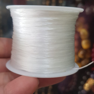 Cuộn Dây Thun CO GIÃN màu Trắng xỏ vòng hạt chuỗi Dây này là dây thun chuyên xỏ vòng chuỗi màu Trắng, có đủ màu Anh Chị đang đeo chuỗi muốn thay dây khác cho vòng thì đặt cuộn Thun chỉ này nhé 