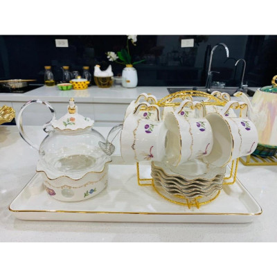 BỘ ẤM CHÉN KÈM KHAY SỨ PHA TRÀ HOA SỨ XƯƠNG CAO CẤP MÀU TRẮNG CÔNG CHÚA VIỀN VÀNG HOA TÍM CÓ ĐẾ ĐUN NẾN