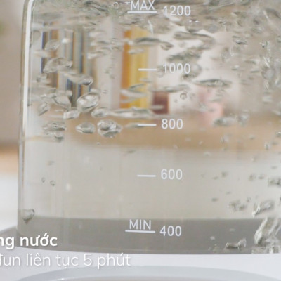 Máy đun và hâm nước pha sữa điện tử Quick  9