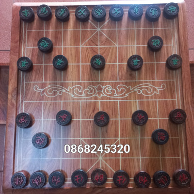 Bộ bàn cờ tướng gỗ hương đá 55×60×8cm + quân gỗ trắc kt 4.5×1.6cm víp