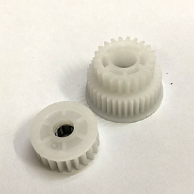 Bộ 2 bánh răng trục chờ: Dùng cho máy photocopy Ricoh 1060/ 1075/ 2051/2060/ 2075/6000/ 6500/ 7500/ 6001/ 7001/ 6002/ 6502/ 7502/ 7503/ 9003 ( HA - Hàng nhập khẩu )