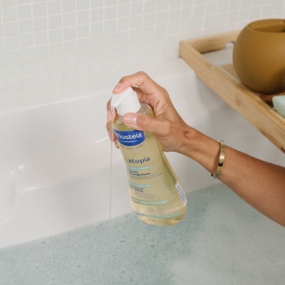 Dầu tắm gội Cho Trẻ Sơ Sinh & Em Bé Da Chàm Thể Tạng Mustela Stelatopia Cleansing Oil 500ml