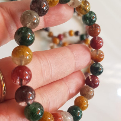 Vòng tay phong thuỷ may mắn đá Thạch anh Ưu linh đa sắc Size hạt 8mm đá Ưu linh đẹp sang trọng của đá thạch anh tự nhiên đa sắc giúp xua tan mệt mỏi, đem đến năng lượng tích cực may mắn tài lộc cho gia chủ ,tăng sự quyến rũ sang trọng cho phái đẹp ạ