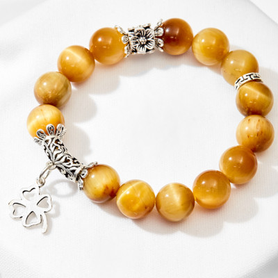 Vòng tay thạch anh mắt hổ vàng phối cỏ 4 lá Ngọc Quý Gemstones